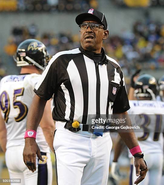 National Football League umpire Chad Brown looks on from the field during a game between the Baltimore Ravens and Pittsburgh Steelers at Heinz Field...