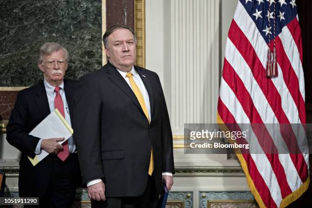 John Bolton, national security advisor, left, and Mike Pompeo, U.S. Secretary of state, attend an Interagency Task Force to Monitor and Combat...