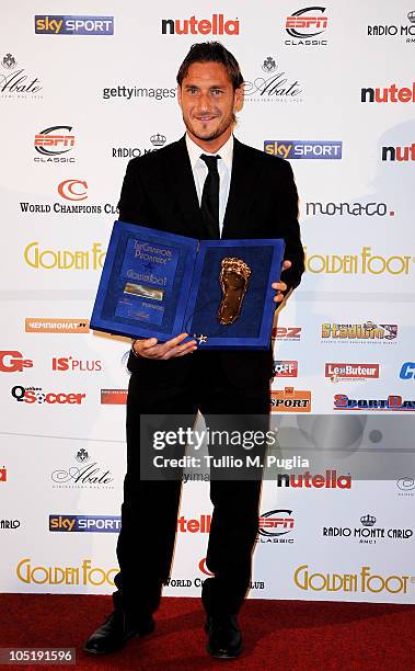 Francesco Totti receives the 2010 Golden Foot award during the Golden Foot Awards ceremony at Fairmont Hotel on October 11, 2010 in Monaco, Monaco.