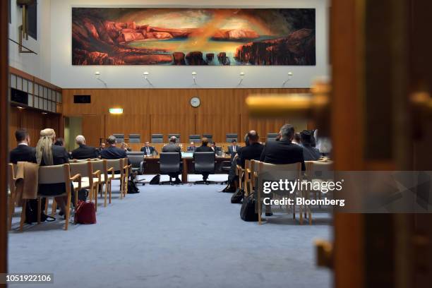 Shayne Elliott, chief executive officer of Australia and New Zealand Banking Group Ltd. , center left, and Alexis George, deputy chief executive...