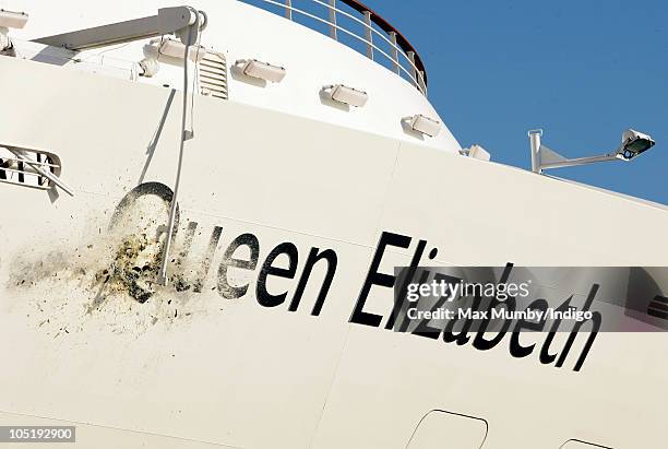 Bottle of Champagne smashes onto the bow of the new Cunard cruise liner 'Queen Elizabeth' during the official naming by Queen Elizabeth II at...