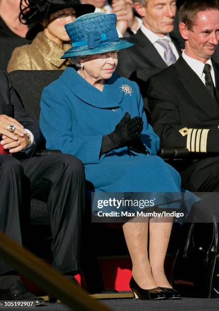 Queen Elizabeth II attends the naming ceremony of Cunard's new crusie liner 'Queen Elizabeth' at Southampton Docks on October 11, 2010 in...