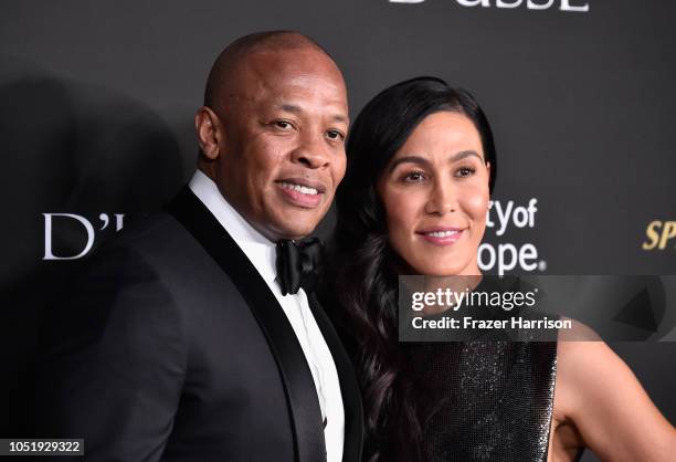 Dr. Dre and Nicole Young attend the City of Hope Spirit of Life Gala 2018 at Barker Hangar on October 11, 2018 in Santa Monica, California.