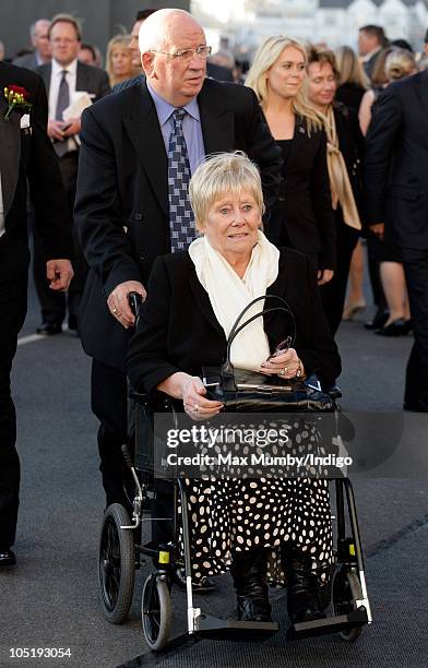 Liz Dawn sits in a wheelchair as she attends the naming ceremony of Cunard's new crusie liner 'Queen Elizabeth' at Southampton Docks on October 11,...