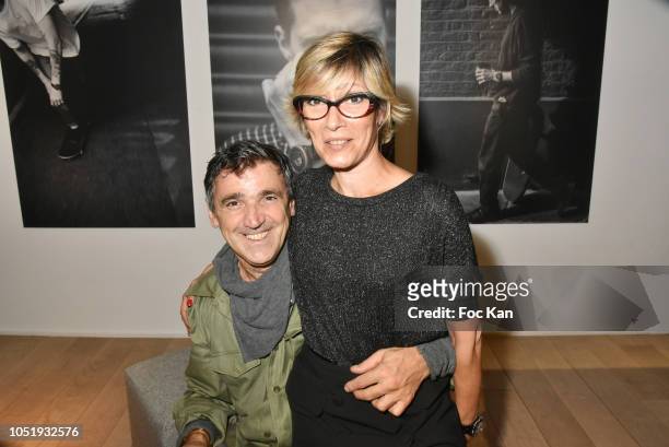 Art director Luigi Di Donna from Red Collector madazine and editor Nathalie Maucolin attend Baume HRS Launch Cocktail at Studio des Acacias October...