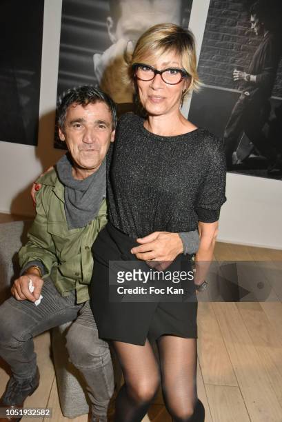 Art director Luigi Di Donna from Red Collector madazine and editor Nathalie Maucolin attend Baume HRS Launch Cocktail at Studio des Acacias October...