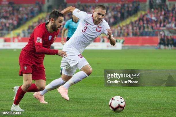 Bernardo Silva , Artur Jedrzejczyk during the UEFA Nations League A group three match between Poland and Portugal at Silesian Stadium on October 11,...