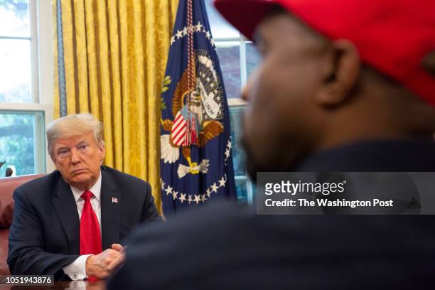 Rapper Kanye West speaks during a meeting with President Donald Trump in the Oval Office of the White House in Washington D.C. On October 11, 2018.