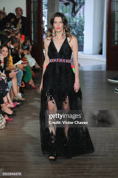 Model walks the runway during the Lydia Lavin fashion show at Mercedes Benz Fashion Week Mexico 2018 at Colonia Roma on October 11, 2018 in Mexico...