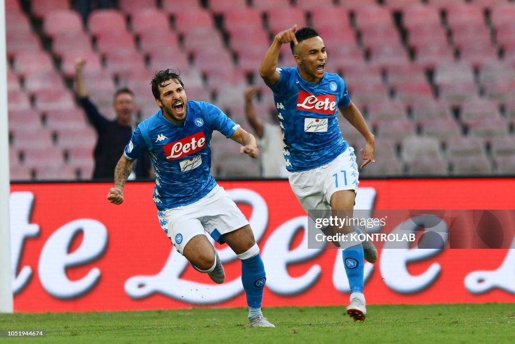 Napoli's striker from France Adam Ounas (R) celebrates with...