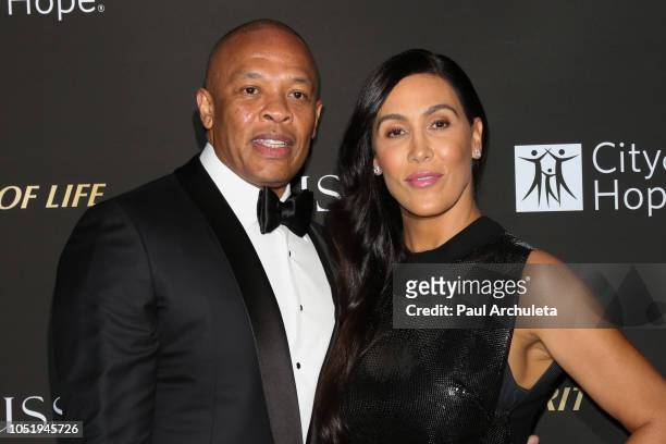 Rapper / Music Producer Dr. Dre and his Wife Nicole Young attend the City Of Hope Gala on October 11, 2018 in Los Angeles, California.