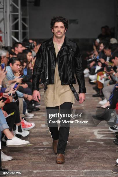 Model walks the runway during the The Pack fashion show at Mercedes Benz Fashion Week Mexico 2018 at Antiguo Colegio de San Ildefonso on October 11,...