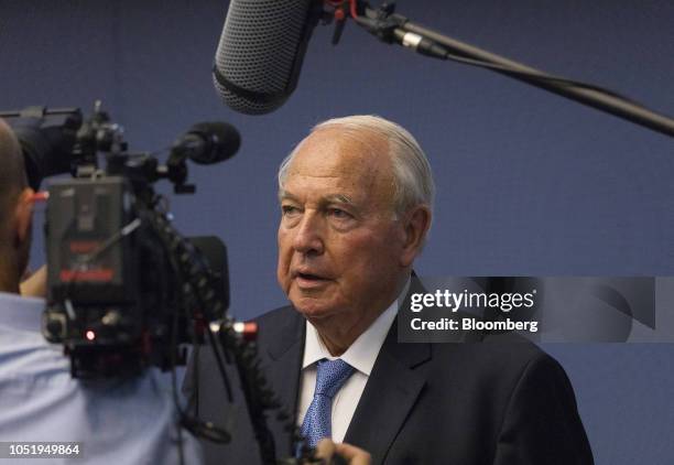 Heinz Hermann Thiele, billionaire and majority owner of Knorr-Bremse AG, speaks during a television interview as the company makes its initial public...