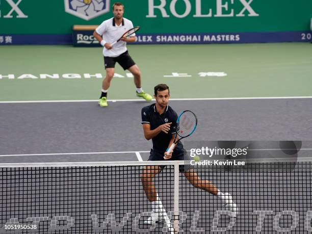 Oliver Marach of Austria and Mate Pavic of Croatia in action against Ivan Dodig of Croatia and Nikola Mektic of Croatia during the Quarter-Final of...