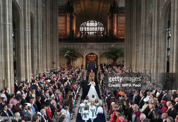 Prince Andrew, Duke of York walks his daughter Princess Eugenie of York down the aisle at the wedding of Princess Eugenie of York to Jack Brooksbank...