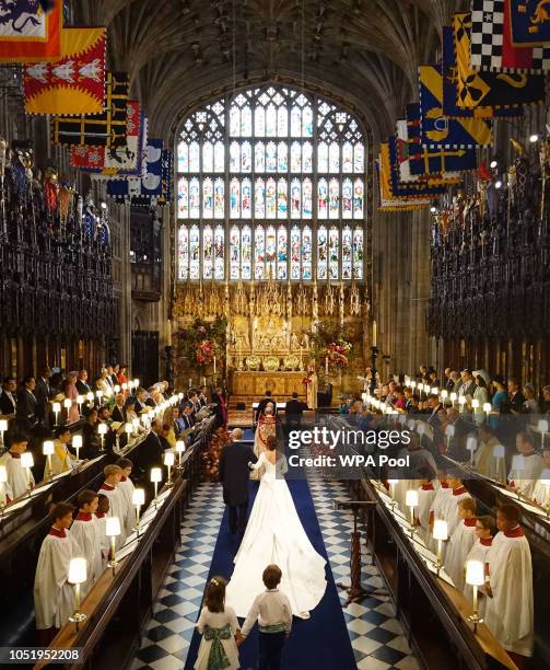 Princess Eugenie of York walks down the aisle with her father Prince Andrew, Duke of York ahead of the wedding of Princess Eugenie of York and Mr....