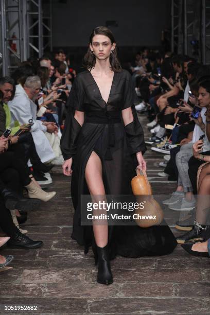 Model walks the runway during the Guillermo Jester - Mexico Disena by Elle fashion show at Mercedes Benz Fashion Week Mexico 2018 at Antiguo Colegio...