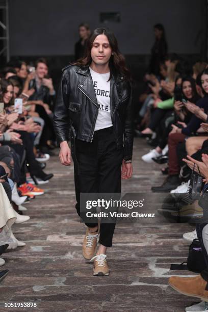 Fashion designer Jesus de la Garsa walks the runway during the fifth day of Mercedes Benz Fashion Week Mexico 2018 at Antiguo Colegio de San...