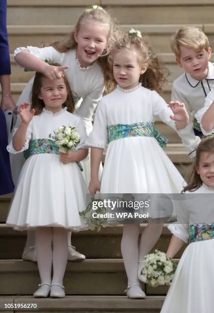 Bridesmaids Princess Charlotte of Cambridge, Savannah Phillips, Maud Windsor and page boy Prince George of Cambridge on the steps after the wedding...