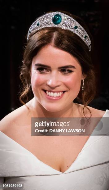Britain's Princess Eugenie of York wears the Queen's Greville Emerald tiara during her wedding to Jack Brooksbank at St George's Chapel, Windsor...