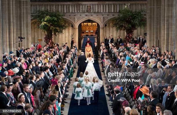 The Duke of York walks his daughter Princess Eugenie down the aisle for her wedding to Jack Brooksbank at St George's Chapel in Windsor Castle on...