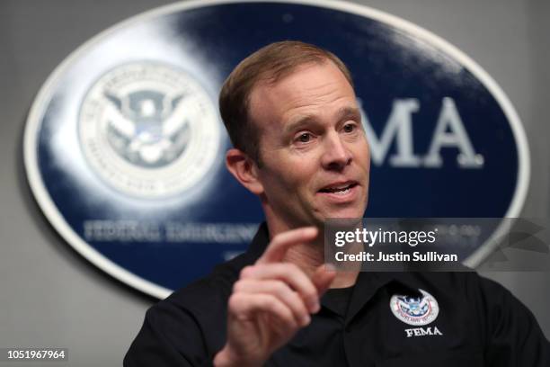 Federal Emergency Management Agency Administrator Brock Long speaks during a briefing on Hurricane Michael at FEMA headquarters on October 12, 2018...