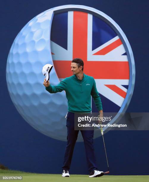 Justin Rose of England acknowledges the crowd after finishing his round during Day Two of the Sky Sports British Masters at Walton Heath Golf Club on...