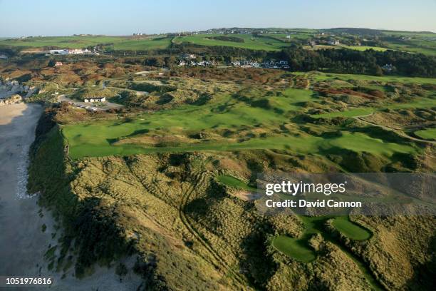 An aerial photograph from out to sea of the par 3, sixth hole Harry Colts' in the foreground and the par 4, fifth hole 'White Rocks' behind on the...