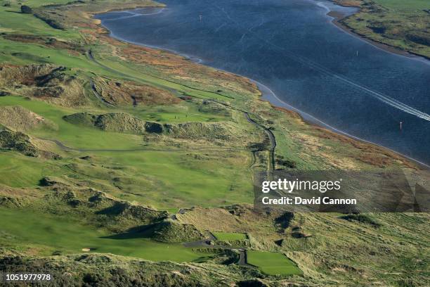 An aerial photograph looking at the par 5, fourth hole in the foreground, and the par 4, fith hole in the centre with the par 3, 12th hole behind at...