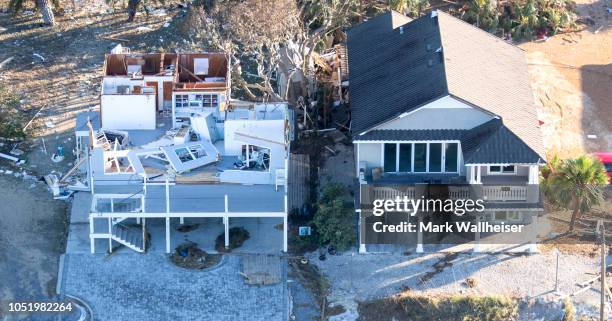 Homes and businesses along US 98 are left in devastation by Hurricane Michael on October 12, 2018 in Mexico Beach, Florida. At least 13 people have...