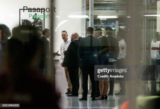 Pastor Andrew Brunson accompanied by his wife Norine Brunson and The U.S. Embassy Charge d'Affaires in capital Ankara, Jeffrey Hovenier arrives at...