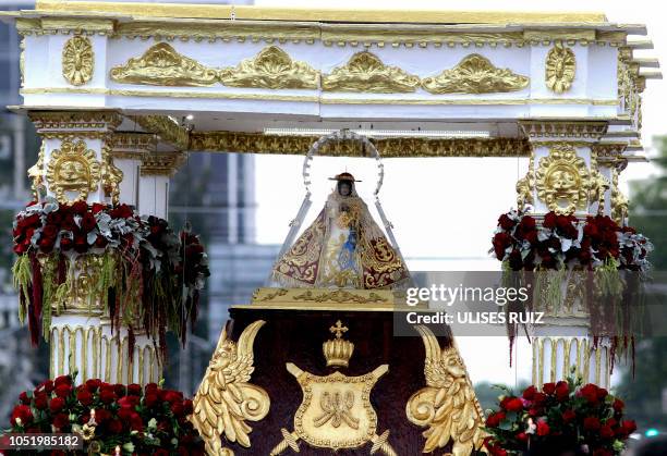 View of the image of the Virgin of Zapopan, during the annual pilgrimage towards the Cathedral of Zapopan, in Zapopan, state of Jalisco, Mexico, on...