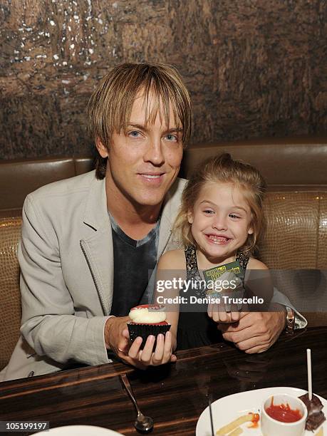 Larry Birkhead and Dannielynn Birkhead attend Beso restaurant at CityCenter for the World Hunger Relief fundraiser on October 11, 2010 in Las Vegas,...