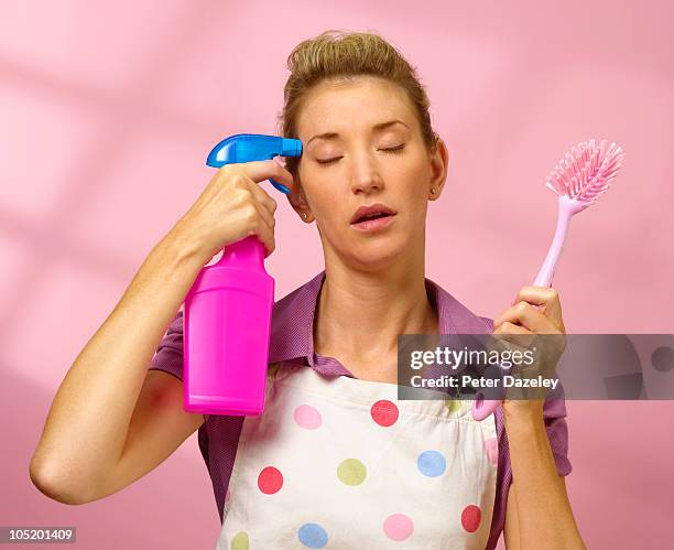 suicide with cleaning equipment - studio shot lonely woman stock pictures, royalty-free photos & images