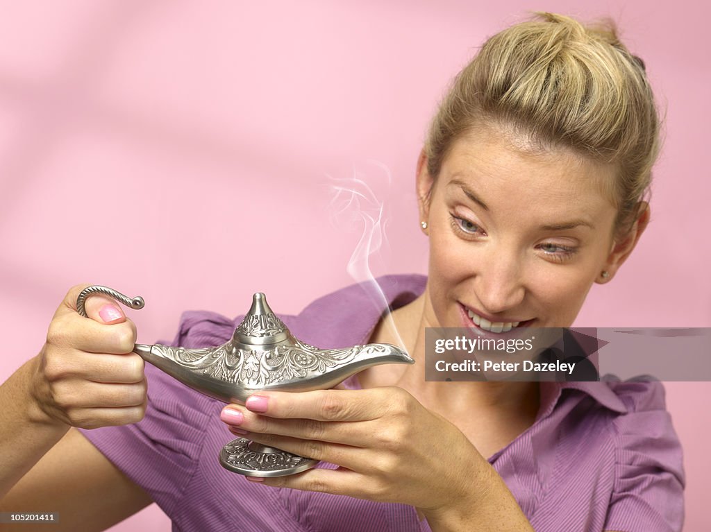 Woman with genie lamp