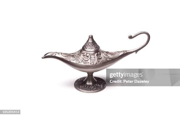genies aladdin lamp with white background - esprimere un desiderio foto e immagini stock