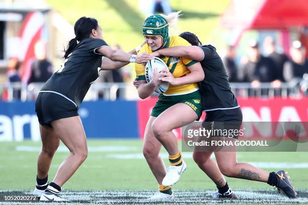 Jessica Sergis of the Australia is tackled during the women's Trans Tasman rugby league international between New Zealand and Australia at Mt Smart...