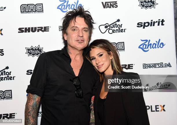 Musician Tommy Lee of Motley Crue and Brittany Furlan attend the Strange 80's concert at The Fonda Theatre on October 12, 2018 in Los Angeles,...