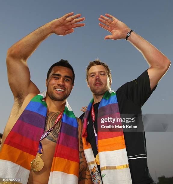 Sherwin Stowers and Kurt Baker of New Zealand celebrate after winning the rugby 7's Gold Medal match between New Zealand and Australia at Delhi...