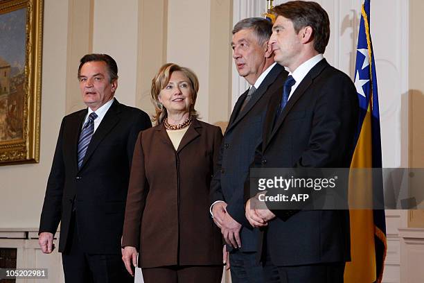 Secretary of State Hillary Clinton poses with members of the Bosnian tripartite presidency, Haris Silajdzic , Nebojsa Radmanovic and Zeljko Komsic in...