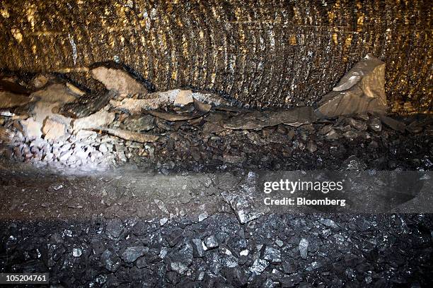 Coal travels on a belt to the surface after being sheared in Foresight Energy LLC's Pond Creek longwall coal mine in Johnston City, Illinois, U.S.,...