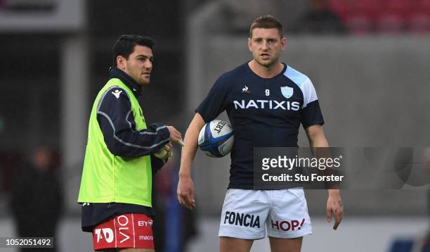 Racing fly half Finn Russell chats to Sam Hidalgo Clyne of the Scarlets before the Champions Cup match between Scarlets and Racing 92 at Parc y...