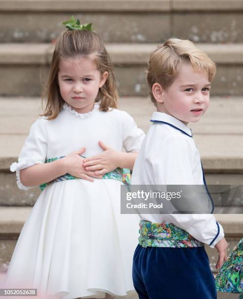 Princess Charlotte of Cambridge and Prince George of Cambridge attend the wedding of Princess Eugenie of York and Jack Brooksbank at St. George's...