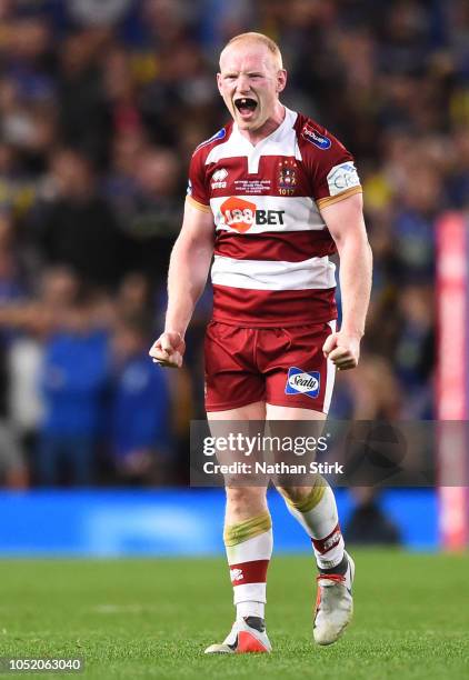 Liam Farrell of Wigan Warriors celebrates after the winning try was scored during the BetFred Super League Grand Final between Warrington Wolves and...