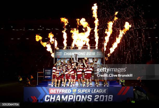 Wigan Warriors celebrate with the trophy following victory in the BetFred Super League Grand Final between Warrington Wolves and Wigan Warriors at...