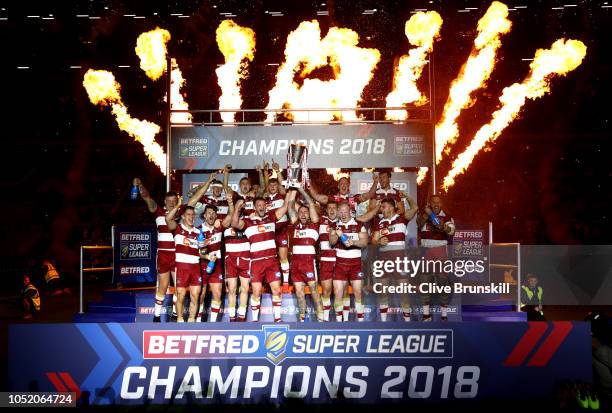 Wigan Warriors celebrate with the trophy following victory in the BetFred Super League Grand Final between Warrington Wolves and Wigan Warriors at...