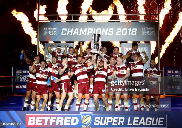 Wigan Warriors celebrate with the trophy following victory in the BetFred Super League Grand Final between Warrington Wolves and Wigan Warriors at...