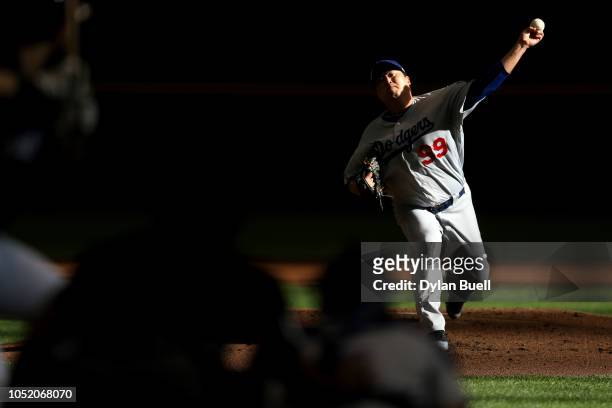 Hyun-Jin Ryu of the Los Angeles Dodgers throws a pitch against the Milwaukee Brewers during the first inning in Game Two of the National League...