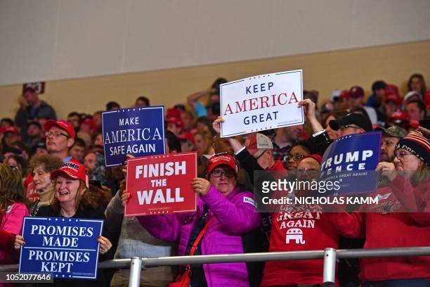 Supporters of US President Donald Trump attend a "Make America Great Again" rally at the Eastern Kentucky University, in Richmond, Kentucky, on...