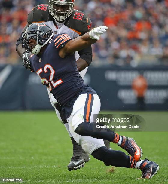 Khalil Mack of the Chicago Bears rushes past Demar Dotson of the Tampa Bay Buccaneers at Soldier Field on September 30, 2018 in Chicago, Illinois....